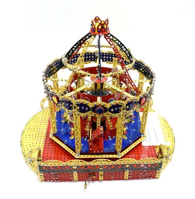 Lot 3415 - Meccano/Gilbert Fairground Carousel detailed working model, operated by hand crank base 24'',...