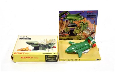 Lot 3460 - Dinky 101 Thunderbird 2 1st version, matt green with thin legs, in display box (E-G box G)