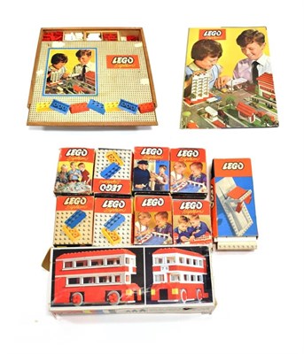 Lot 3508 - Lego Set In Wooden Box with red/white parts, windows, clear bricks and other; together with a...