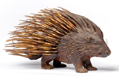 Lot 899 - Rare Figure of a Porcupine, Franz Bergmann, Austria, standing on all fours and turning slightly...