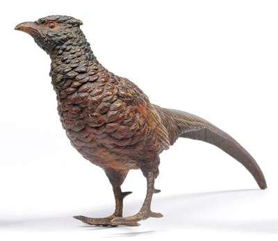 Lot 901 - Cock Pheasant, unmarked, standing and turning slightly to the right, 14cm high, 33.5cm long