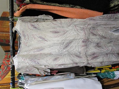 Lot 1065 - A quantity of assorted circa 1970s and 80's costume, evening dresses, cotton dresses,...