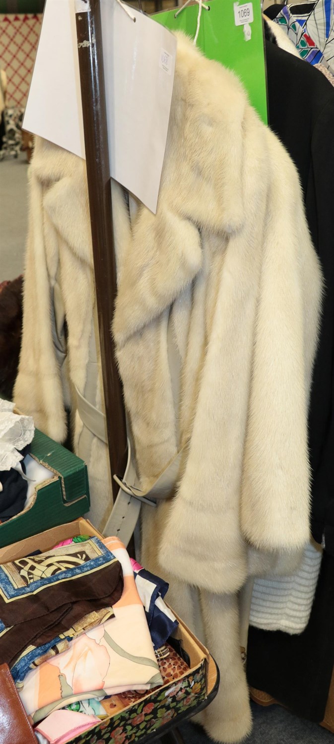 Lot 1068 - Ellis Barker Furs Chester cream mink coat with leather insertions and leather belt and white...