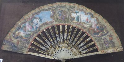 Lot 1080 - A mid-18th century cased French ivory fan, the leaf appearing to be a layer of stiffened net to the