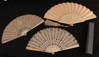 Lot 1085 - An early 20th century bone fan, the monture gently painted with small flowers in pastel colours...