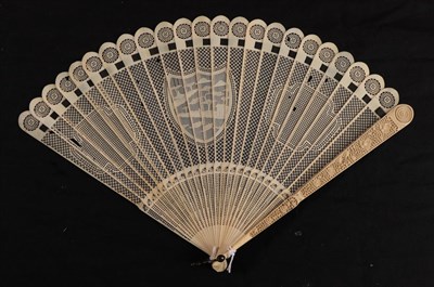 Lot 1086 - A large late 18th century Chinese carved ivory brisé fan Qing Dynasty, finely carved...
