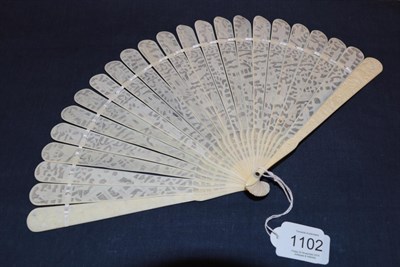 Lot 1102 - A circa 1840's Chinese carved ivory brisé fan, Qing Dynasty, with 21 inner sticks and two...