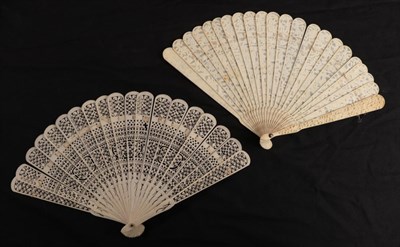 Lot 1103 - A circa 1840's Chinese Carved Ivory Brisé fan, Qing Dynasty, the twenty inner sticks and two...
