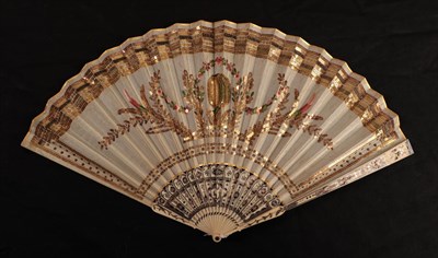 Lot 1108 - A Regency period ivory fan, with barrel head, the leaf, in cream silk, is embroidered in...
