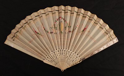 Lot 1108 - A Regency period ivory fan, with barrel head, the leaf, in cream silk, is embroidered in...