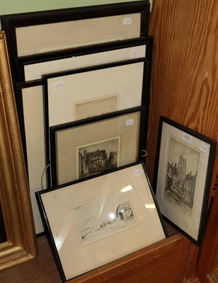 Lot 1173 - An interesting group of signed etchings depicting various townscapes, church interior and genre...