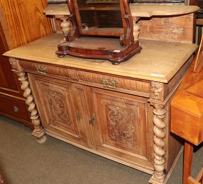 Lot 1225 - A late 19th century carved oak sideboard, rectangular moulded top with galleried back, two...