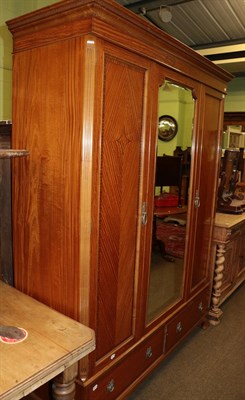 Lot 1227 - A Waring and Gillows two door satinwood wardrobe, stamped and labelled, 160cm wide