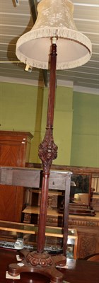 Lot 1236 - An early 20th century carved mahogany standard lamp and shade