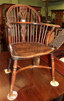 Lot 1244 - A 19th century yew wood Windsor chair, with elm moulded seat