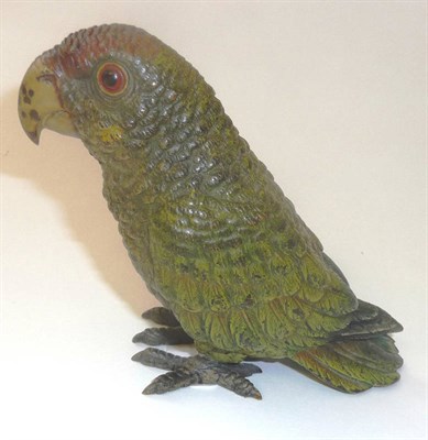 Lot 918 - A Cold Painted Bronze Figure of a Parrot, 20th century, perched with green feathers and red...