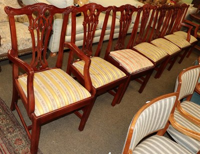 Lot 1252 - A set of eight reproduction Chippendale style hardwood dining chairs, including two carvers