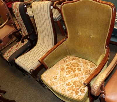 Lot 1255 - A pair of Danish nursing chairs and a Danish armchair upholstered in green velvet