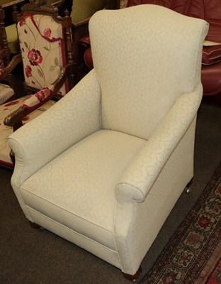 Lot 1264 - An upholstered armchair