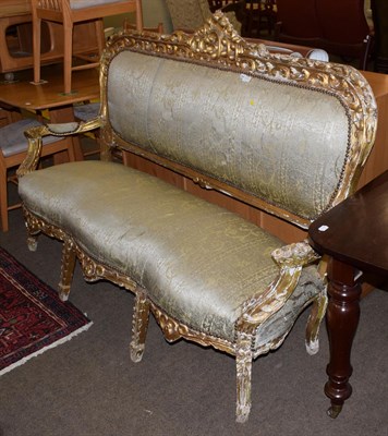 Lot 1271 - French style carved giltwood three seater sofa, 181cm wide