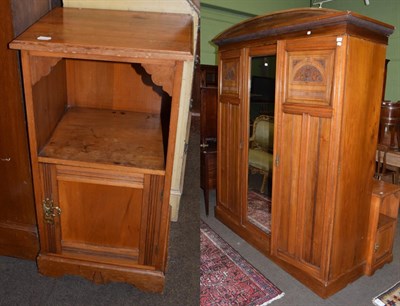 Lot 1274 - A late Victorian walnut triple door wardrobe, 183cm wide; together with a similar bedside...