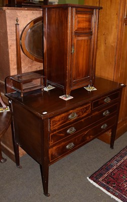 Lot 1275 - A late Victorian mahogany four-drawer dressing table; and a later Victorian walnut bedside cupboard