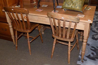 Lot 1280 - A Victorian pine kitchen table, fitted two drawers, 150cm long; together with two pine kitchen...