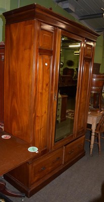 Lot 1282 - A Victorian mirror fronted panelled wardrobe fitted with two base drawers; and a 19th century...