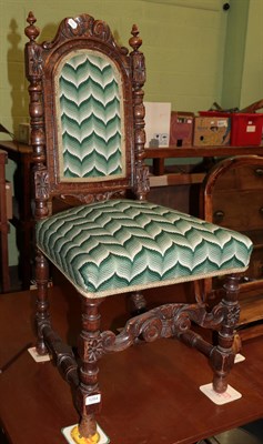 Lot 1284 - A 19th century part upholstered carved oak hall chair, in 17th century style