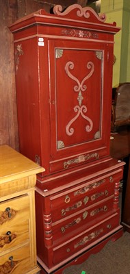 Lot 1285 - A late 19th century Danish red painted cabinet on chest, with scrollwork adorned pediment and...