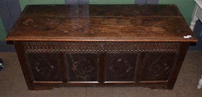 Lot 1295 - An early 18th century joined oak chest with hinged lid