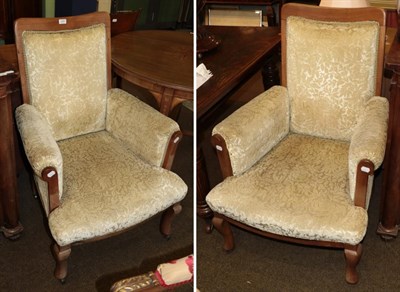 Lot 1297 - A pair of late 19th century mahogany armchairs upholstered in floral cut velvet, 73cm wide;...