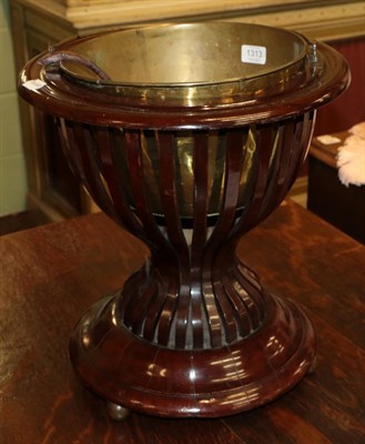 Lot 1313 - A 19th century mahogany planter with brass liner