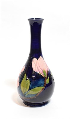 Lot 4 - A Walter Moorcroft bottle vase, signed to base, 32cm high
