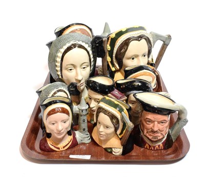 Lot 18 - A complete set of Royal Doulton Henry VIII and his wives character jugs, together with three larger