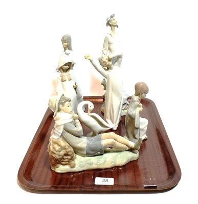 Lot 28 - Six various Lladro figures, together with a single Nao figure, including boxes (7)