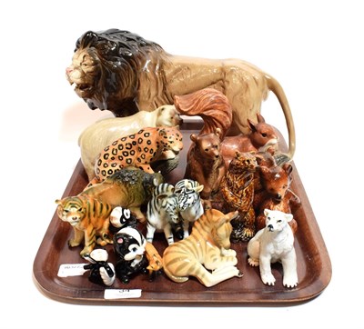 Lot 34 - A collection of wild animals including Melba Ware lion and various other animal models