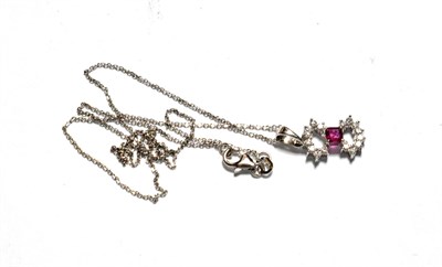 Lot 46 - A ruby and diamond pendant on chain, pendant length 2cm, chain length 40cm