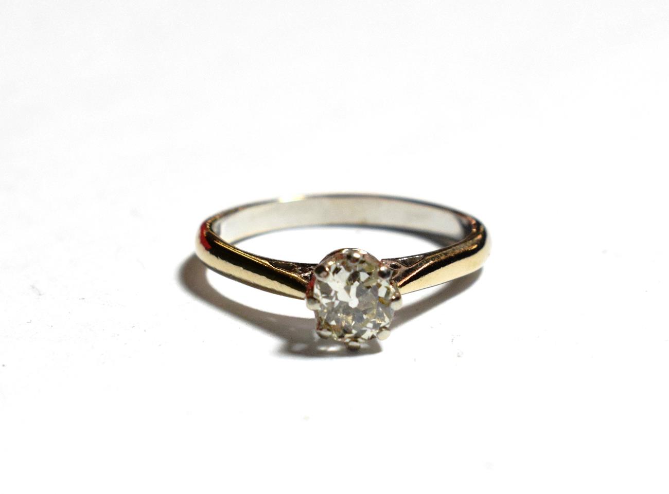 Lot 50 - An 18 carat white gold diamond solitaire ring, the old cut diamond in a claw setting to a...