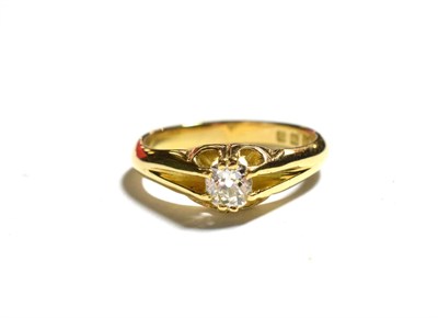 Lot 52 - An 18 carat gold diamond solitaire ring, the old cut diamond in a yellow claw setting, to a...