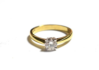 Lot 53 - An 18 carat gold diamond solitaire ring, a round brilliant cut diamond in a claw setting, to...