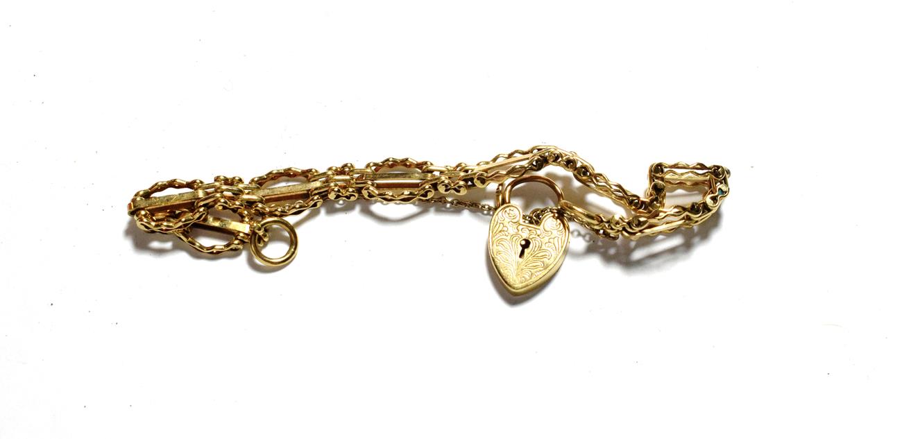 Lot 58 - A 9 carat gold fancy link bracelet with engraved padlock, length 19cm