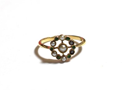 Lot 59 - An emerald and pearl cluster ring, stamped '15CT', finger size M1/2