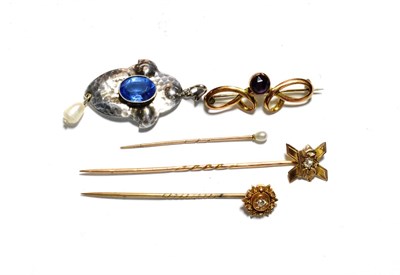 Lot 66 - Two diamond set stick pins (one stamped '15CT', the other unmarked); a cultured pearl stick...