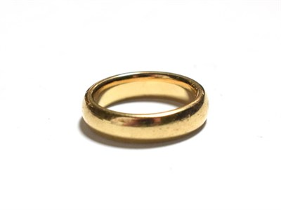Lot 74 - A 9 carat gold band ring, finger size J