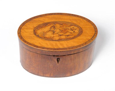 Lot 932 - A George III Satinwood Oval Tea Caddy, the hinged top with foliate and scroll inlaid oval...