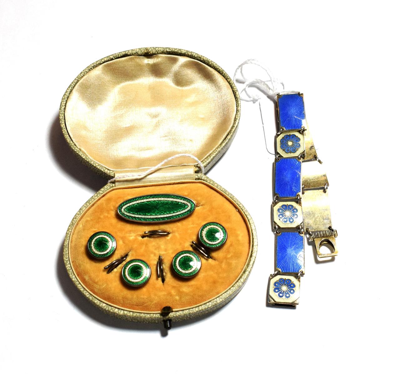 Lot 78 - A David Andersen enamel bracelet; and a Rims & Backs button and brooch suite (a.f.)