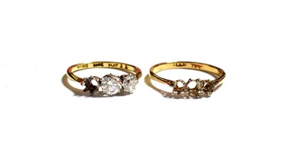 Lot 83 - A diamond three stone ring (one stone deficient), finger size L1/2; a three stone ring mount,...