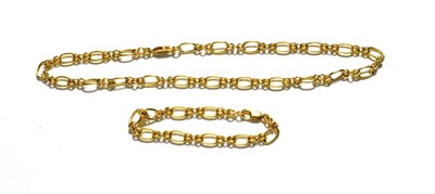 Lot 94 - An 18 carat gold fancy link necklace, length 41.5cm and a matching bracelet, length 19cm (2)