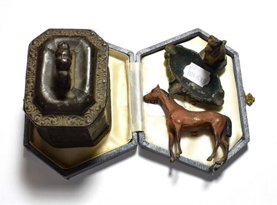 Lot 98 - Lead tobacco box; a cold painted bronze racehorse; a British made ashtray